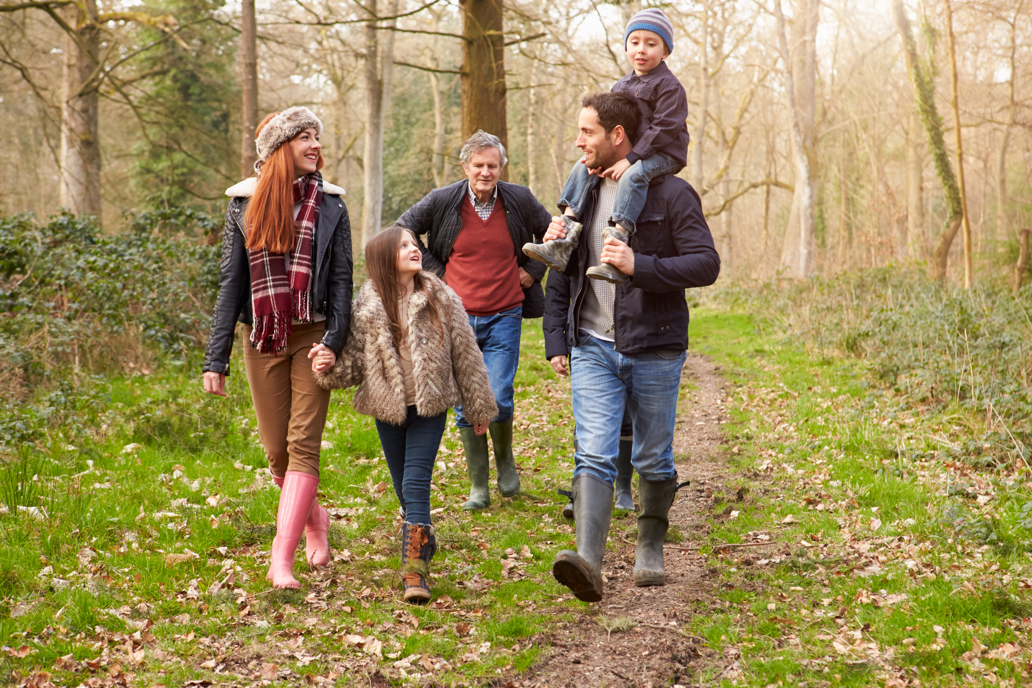 Multi Generation Family On Countryside Walk